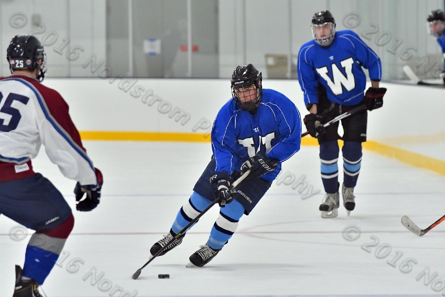 Wheaton College Men\'s Ice Hockey vs Middlesex Community College. - Photo By: KEITH NORDSTROM